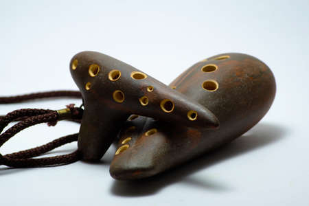 ocarina brown on white background (Flute made of clay)の写真素材