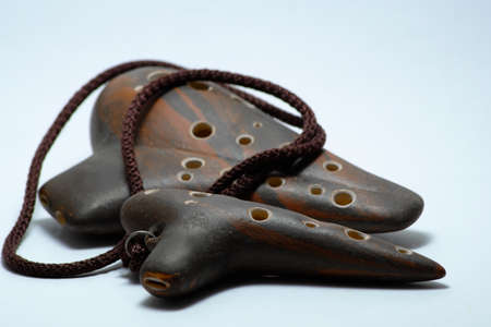 ocarina brown on white background (Flute made of clay)の写真素材