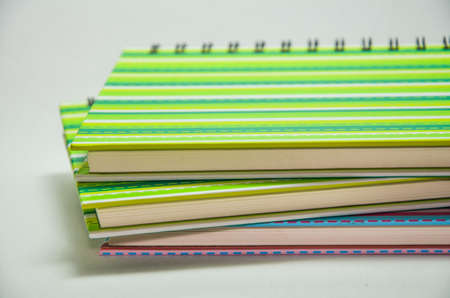 blank spiral notebook on white background.の写真素材