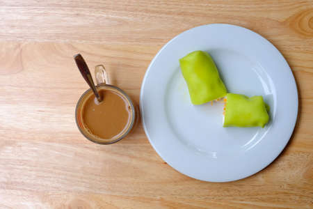 Crepes With foi thong on white plate (Thai dessert)