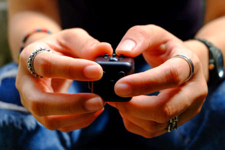 Fidget Cube stress reliever, fingers toy, black. (relax)の写真素材