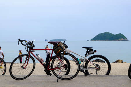 Songkhla, Thailand - october 27, 2017 Vintage bicycles at Songkhla Lake against sea backgroundのeditorial素材