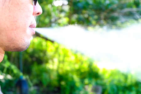 e-cigarette close up on nature backgroundの写真素材