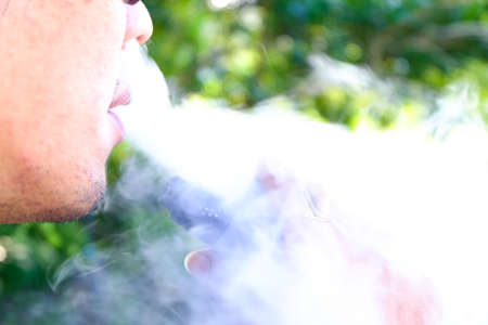 e-cigarette close up on nature backgroundの写真素材