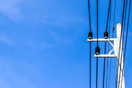 The electric pole and electric transformer with clear blue skyの写真素材