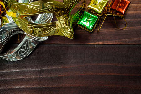 Christmas background with decorations and gift boxes on wooden boardの写真素材