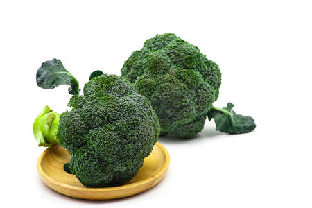 Vegetable Kerry Blocks on wood plate isolated white background.の写真素材