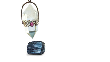 holding and using black tourmaline pendulum and using it In asking questions. quartz crystal.の写真素材
