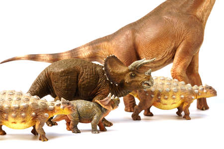 The Dinosour crowd eats plants and is walking in search of food sources. isolated on background....