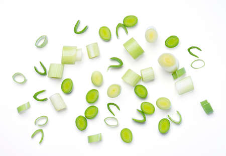Isolated chopped fresh.  cut spring onions on white background. Top view. clipping path.