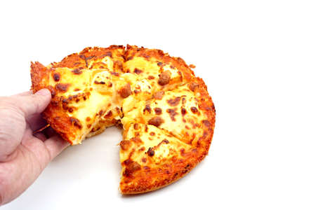 Pizza with very much cheese melting. Hot pizza slice with melting cheese isolated on a white background.の写真素材