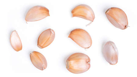 Top view fresh peeled garlic cloves, bulb with garlic slices isolated on white background. clipping path.の写真素材