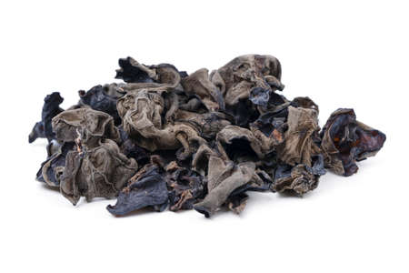 Isolated Black ear mushroom dried. Black fungus or ear mushroom on white background. with clipping path.の写真素材