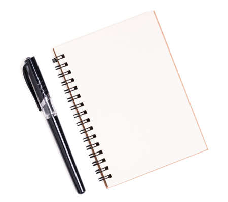 Isolated pen and notebook. Top view of spiral kraft notebook front, open page on background for mockup with clipping path.の写真素材
