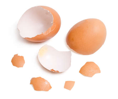 Isolated Broken eggshell. Top view group of broken eggshells stacked on white background.