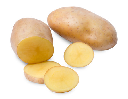 Isolated potato. Whole potato and cut raw potato vegetables on white background. Harvest new. Flat lay, top viewの写真素材