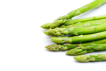 Fresh green asparagus isolated on white background.の写真素材