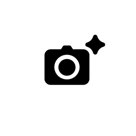 Black camera icon features shiny sparkle mark. ideal for app interfaces or graphic design projects.のイラスト素材