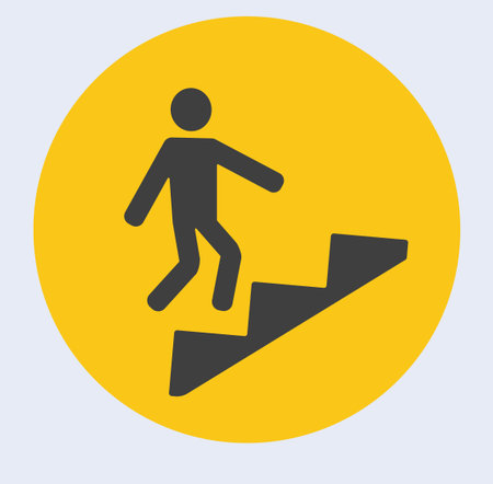Caution: person falling downstairs safety icon.