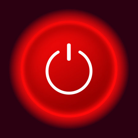 Red backlit power icon on dark background.のイラスト素材
