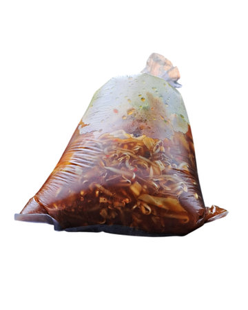 Tahu Campur in plastic bag isolated on white background with clipping path.  from East Java, Indonesiaの写真素材