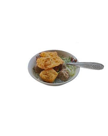 Bakso in a bowl isolated on white background with clipping path. Bakso, indonesian meatball soup with noodles.の写真素材