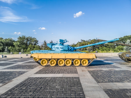 KIEV, UKRAINE - JUNE 21, 2020: Ukrainian tank painted blue-yellow. Tank T-54 painted in the colors of the flag of Ukraine.のeditorial素材