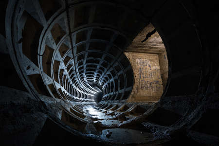 Drainage tunnel that drains water from the slopes to prevent landslides. Dark sewer drainage tunnel...