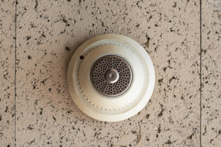 Old Soviet ceiling smoke sensor, close-up.
