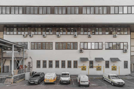 Facade of the building of the left bank post office in Kyiv. Modernist building of 1995. Kyiv, Ukraine - October 2021のeditorial素材