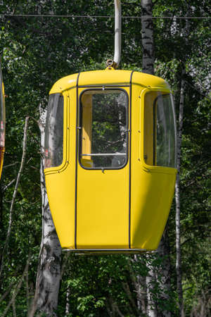 Empty yellow cable car cabin.の写真素材
