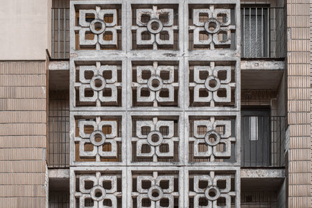 Decorative concrete shabby wall of the house in the style of Soviet modernism.の写真素材