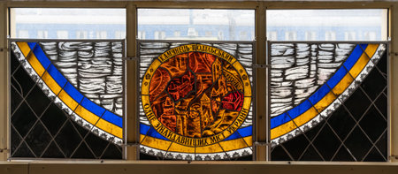 Stained glass window by Zhilinskoyte Khrystyna and Hrynyuk Leontiy on the window in the interior of the Kamianets-Podilskyi railway station. Kamianets-Podilskyi, Ukraine - Nov. 2021.のeditorial素材