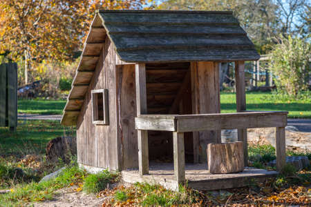 Charming little sunlit playhouse build from natural materialsの写真素材