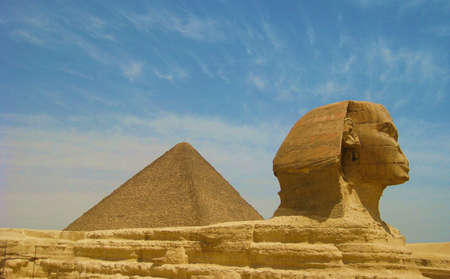 Great Sphinx,Pyramid of Khufu as background,Egypt