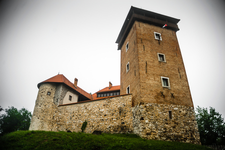 On a hill with a beautiful view of the town on four rivers, lies the Old Town of Dubovac, one of the most attractive and best preserved architectural monuments of the feudal age. In a fog of summer morning.のeditorial素材