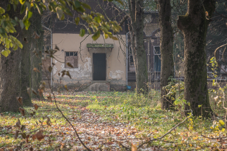 Old building in park at the fall time, rustic and falling apart from elapsed  timeの写真素材