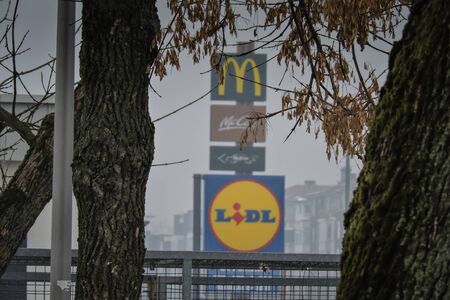 Slavonski Brod, Croatia 1/31/2019: MCdonalds and lidl siggn in city fall, autumnのeditorial素材