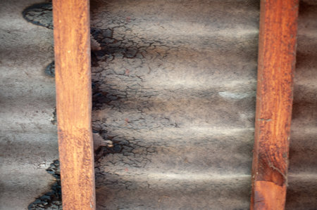 Roof board and slab painted from below and shown by water damage.の写真素材