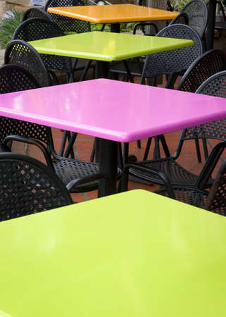 Riverside cafe featuring a colorful table  arrangementの写真素材