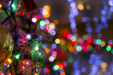 Multicolored blurred lights in a festive restaurantの写真素材