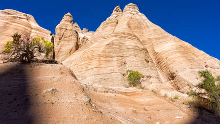 Dramatic hoodoos and geologic formations as seen from a canyon near Cochiti, NMの写真素材