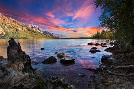 Serene summer morning on Jenny Lake in Grand Teton National Park, WYの写真素材