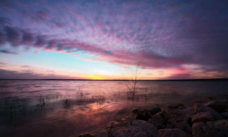 Colorful Sunset Over the Lakeの写真素材