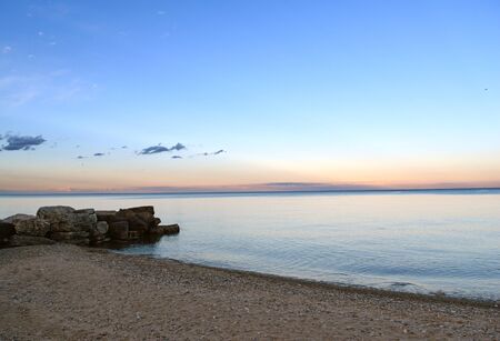 View of the sunset by the beach.の写真素材