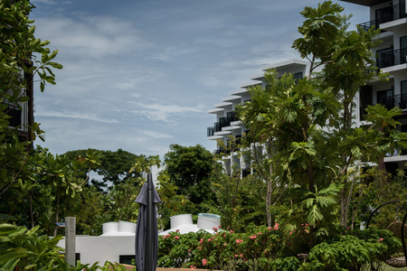 modern office building with green trees.の写真素材