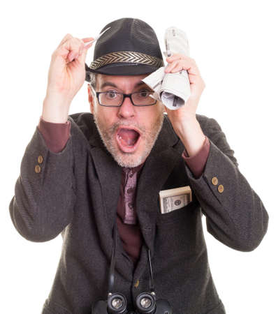 Excited gambler man at horse racesの写真素材