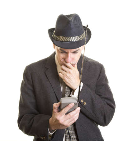 Man watching portable TVの写真素材