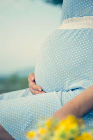 Wildflowers pregnant maternity birth child expectationの写真素材