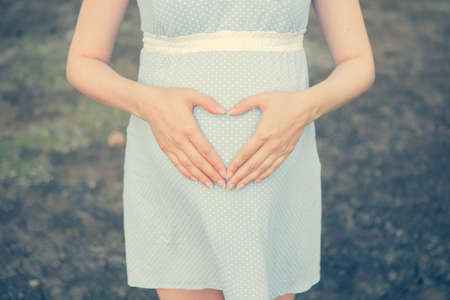 Wildflowers pregnant maternity birth child expectationの写真素材